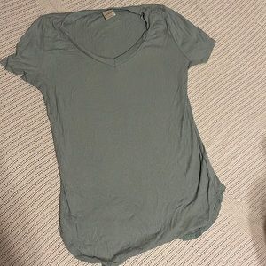 Soft t-shirt. Kind is a sea green-blue. Size medium